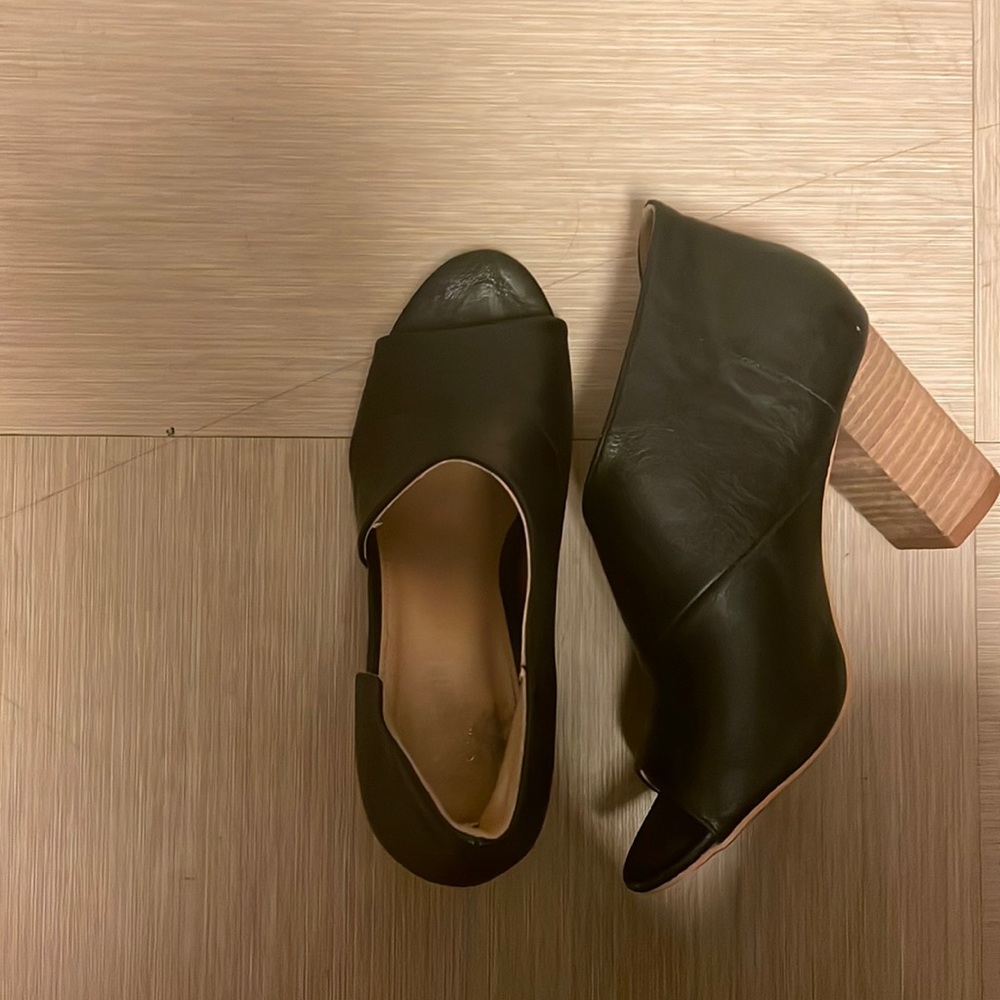 Black leather cutout block heels. Sized 6 1/2. Brand is Catherine Malandrino